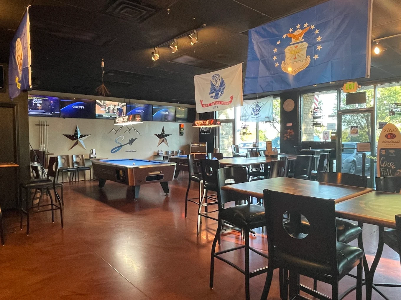 The warm, welcoming interior of a local bar